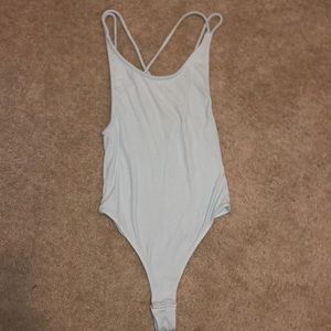 light blue body suit
